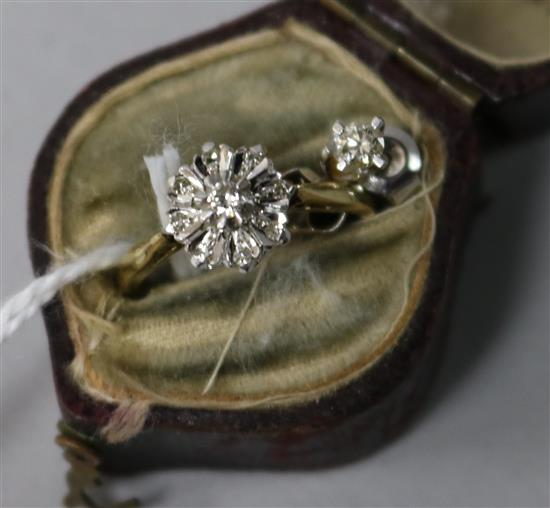 An 18ct gold and diamond cluster ring and a pair of 18ct white gold and diamond ear studs.